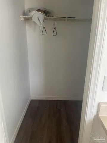 a view of small space with racks on the wall