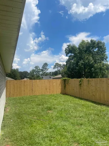 a view of kitchen and windows
