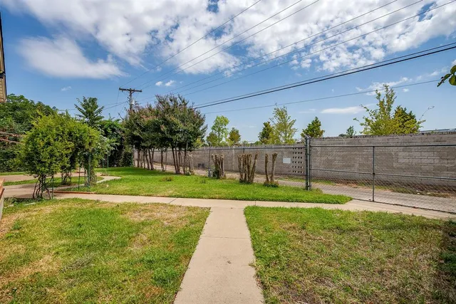 a view of a yard with a slide