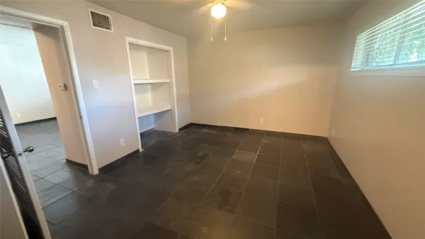 an empty room with a door
