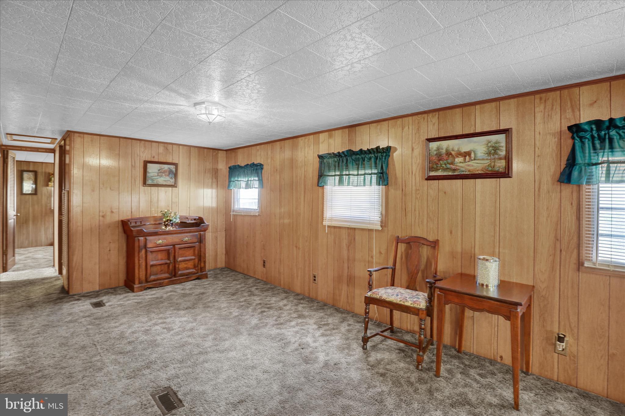 70 Mullen Road Birdsboro, PA 19508 - Photo 11 of 38 a living room with furniture and a open kitchen view