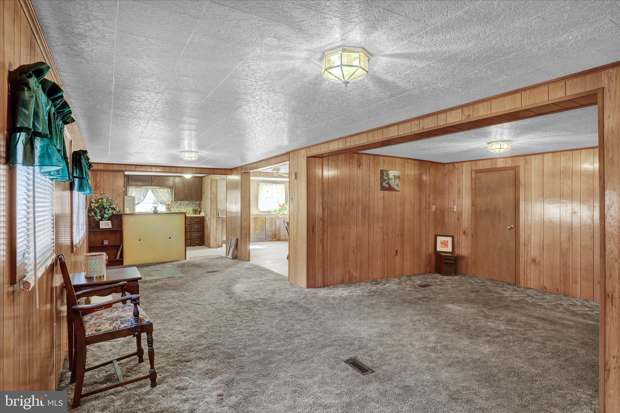 70 Mullen Road Birdsboro, PA 19508 - Photo 12 of 38 a view of a hallway with a table and chairs