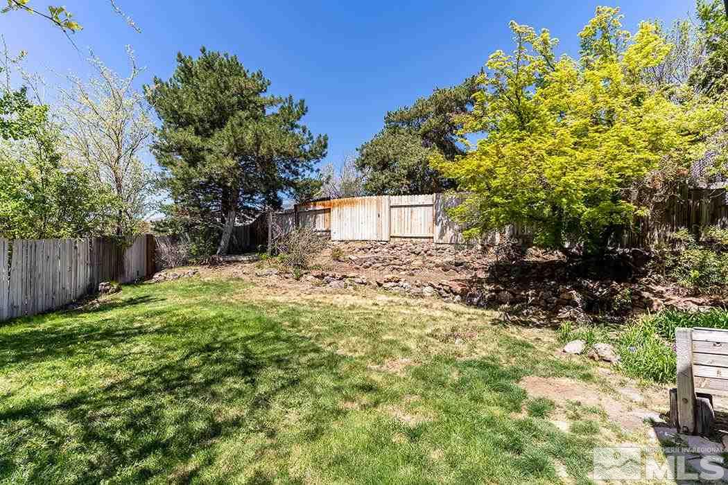 3685 Renee Way Reno, NV 89503 - Photo 24 of 26 a view of a house with a yard