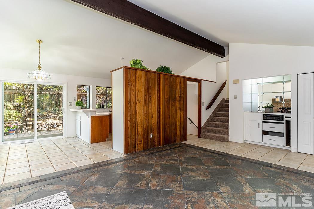 3685 Renee Way Reno, NV 89503 - Photo 6 of 26 a view of a room with wooden floor and stairs
