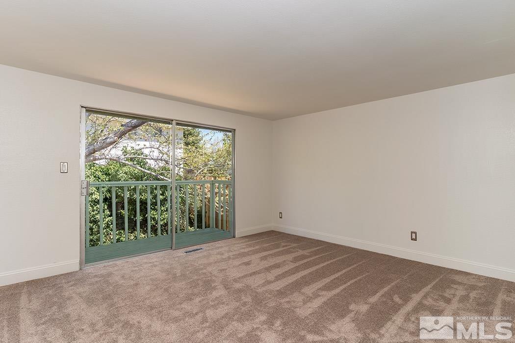 3685 Renee Way Reno, NV 89503 - Photo 10 of 26 a view of a big room with yard and mountain view