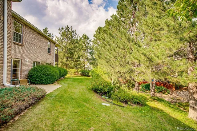 a view of yard with seating space