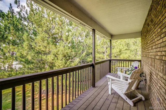 a view of a two chair in the balcony