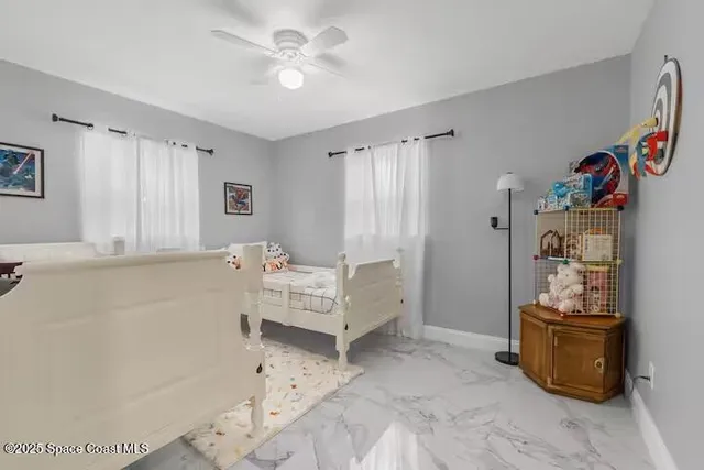 a bedroom with a bed and a cabinets