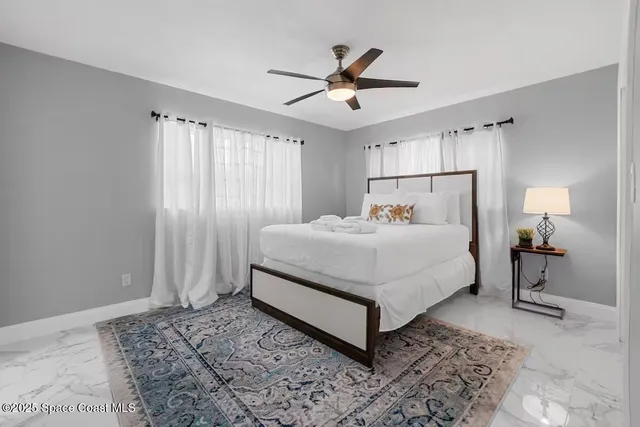 a bedroom with a bed and a walk in closet