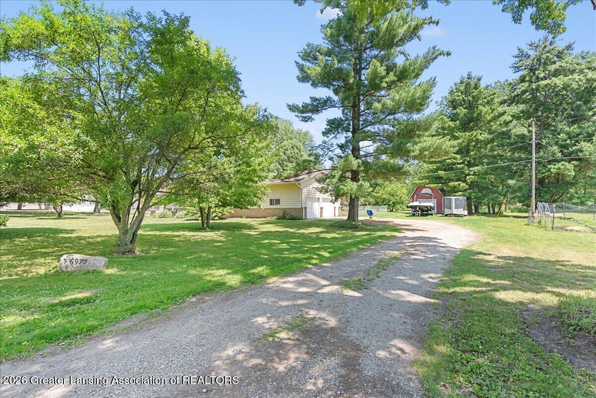 6970 Foster Road Haslett, MI 48840 - Photo 4 of 53 08-Media Jett - 04