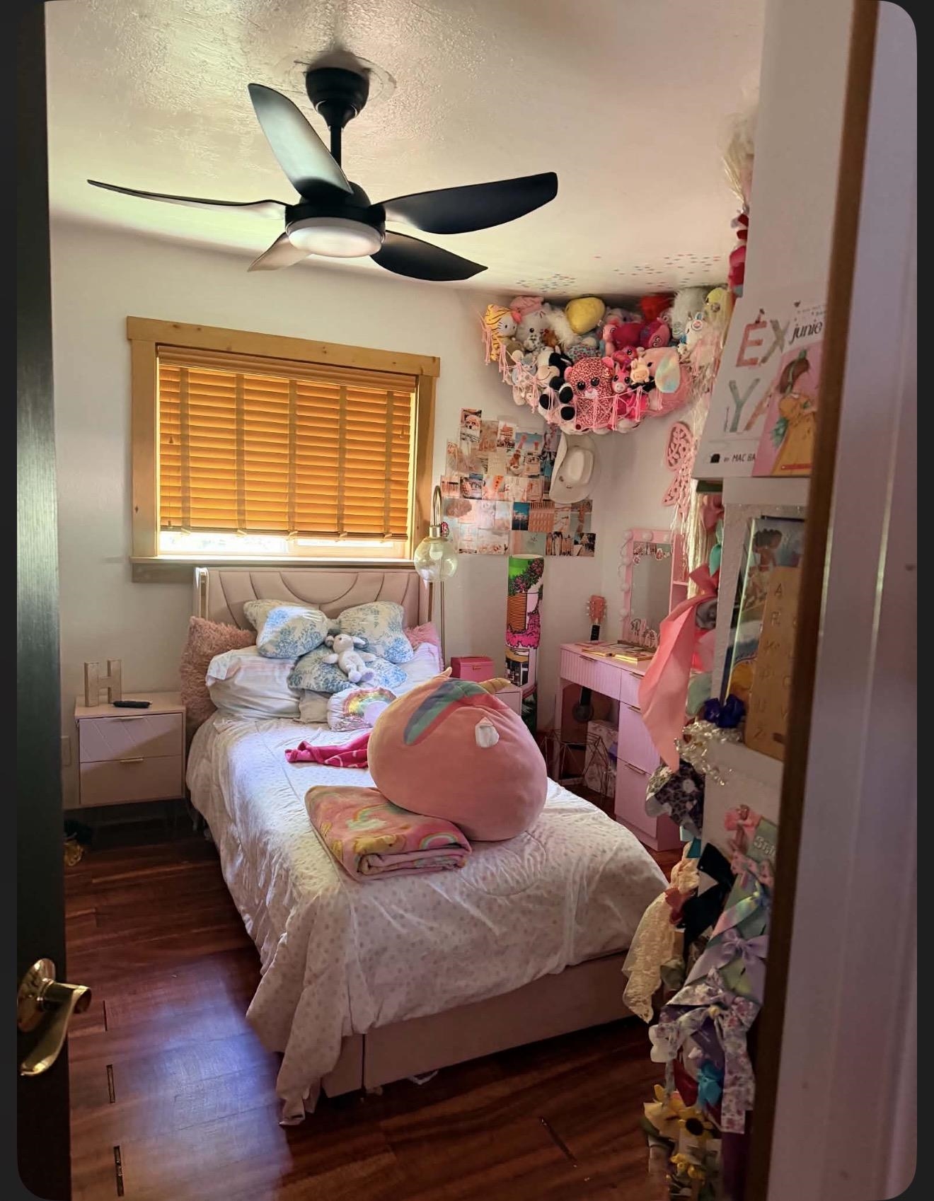 15440 Old Wagon Road Crescent Mills, CA 95934 - Photo 15 of 19 a bedroom with a bed a dresser and a chandelier