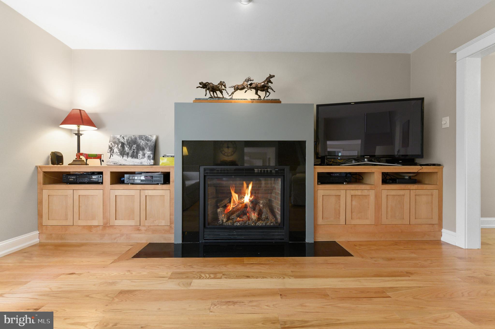 206 Knoll Road Wallingford, PA 19086 - Photo 11 of 35 Cozy gas fireplace and built-ins