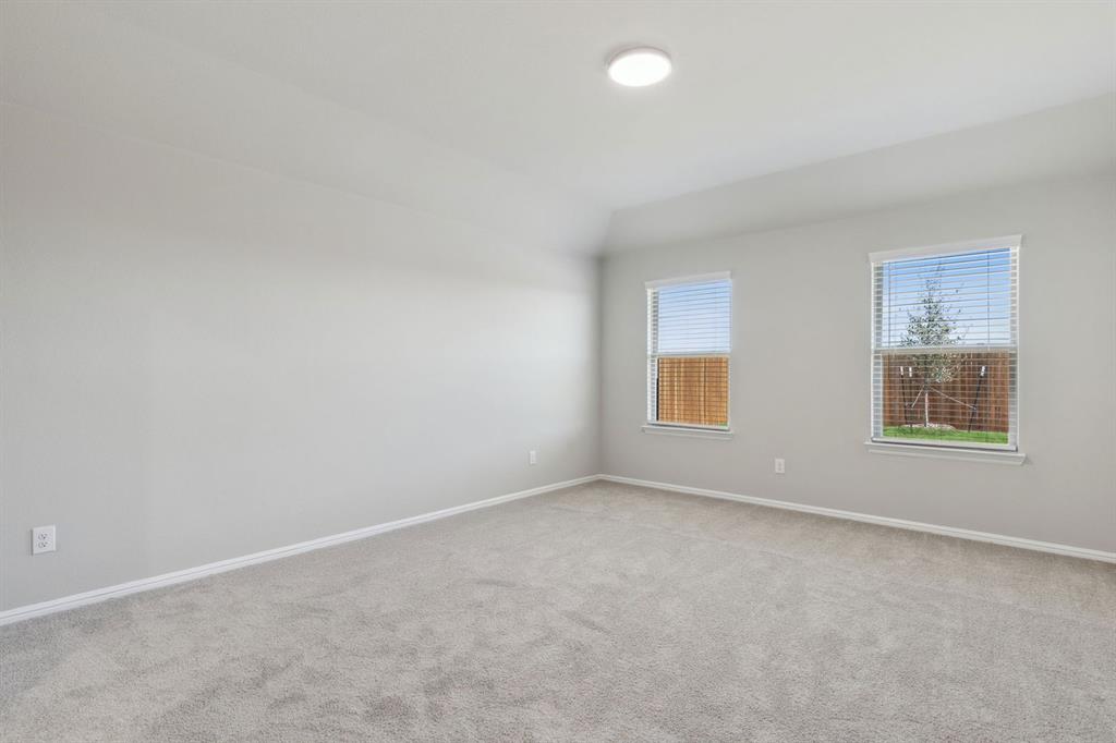 1122 Sunward Road Princeton, TX 75407 - Photo 17 of 36 an empty room with windows