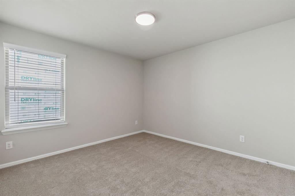 1122 Sunward Road Princeton, TX 75407 - Photo 25 of 36 an empty room with a window