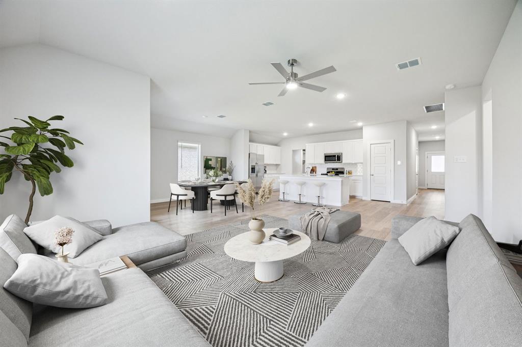 1122 Sunward Road Princeton, TX 75407 - Photo 33 of 36 a living room with furniture and a view of kitchen
