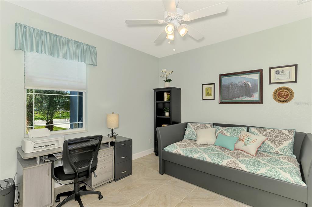 13049 Ridgely Circle Port Charlotte, FL 33981 - Photo 19 of 49 a living room with furniture and a window