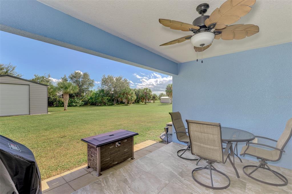 13049 Ridgely Circle Port Charlotte, FL 33981 - Photo 23 of 49 a view of a two chairs in a patio