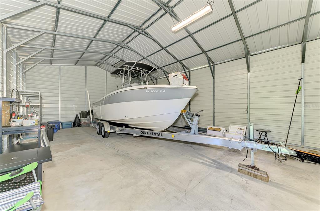 13049 Ridgely Circle Port Charlotte, FL 33981 - Photo 28 of 49 a room with gym equipment