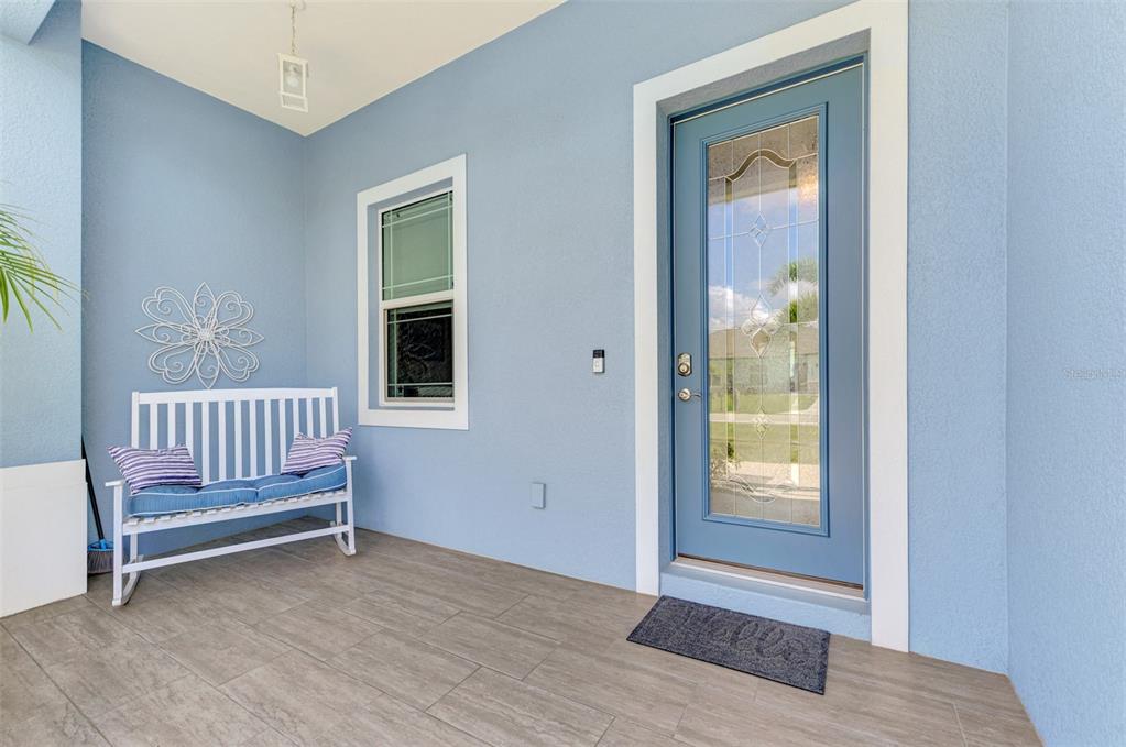 13049 Ridgely Circle Port Charlotte, FL 33981 - Photo 3 of 49 a view of a room with wooden floor and windows