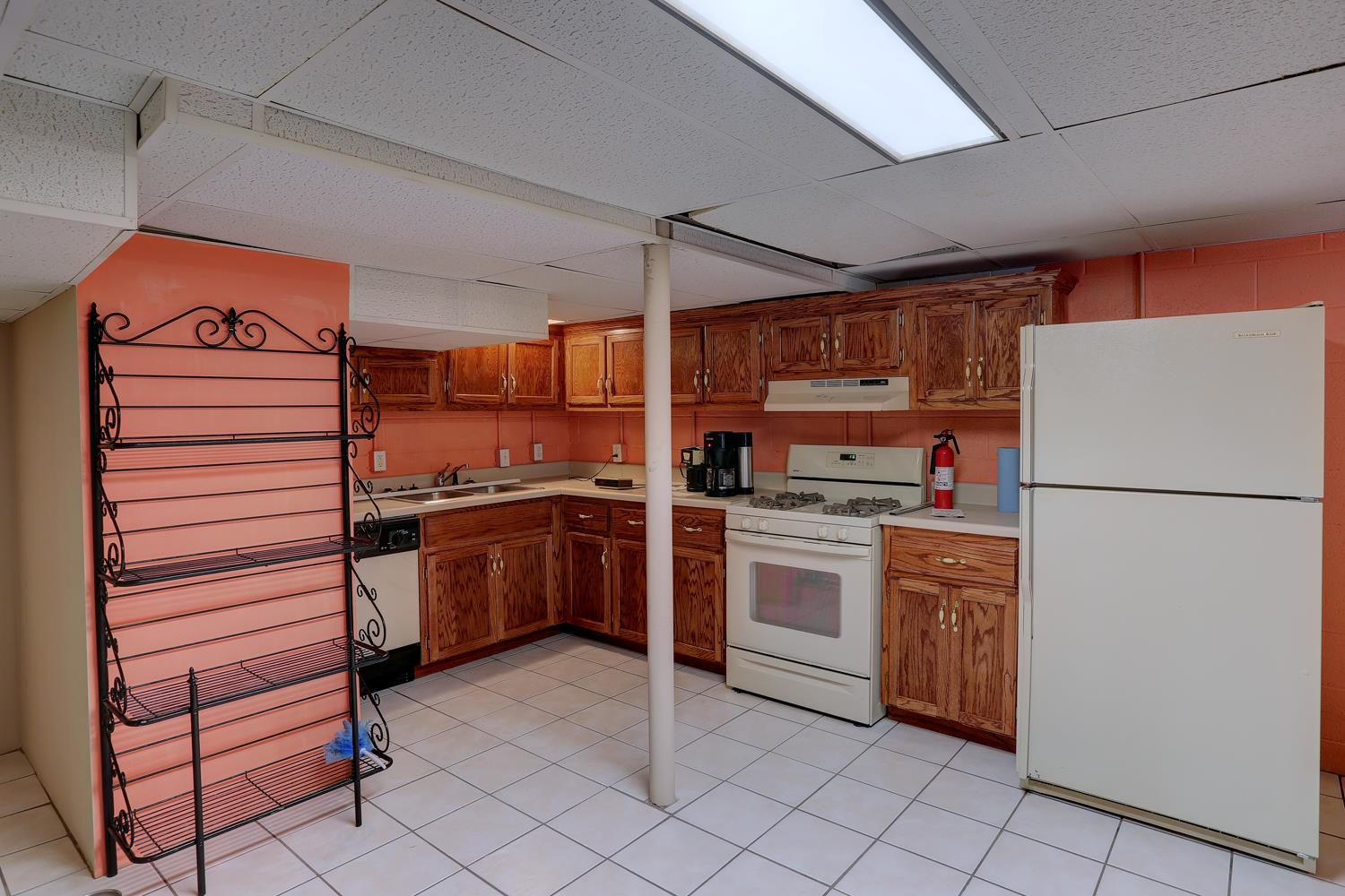 4809 Charles Dorris Road Springfield, TN 37172 - Photo 7 of 27 a kitchen with cabinets and stainless steel appliances