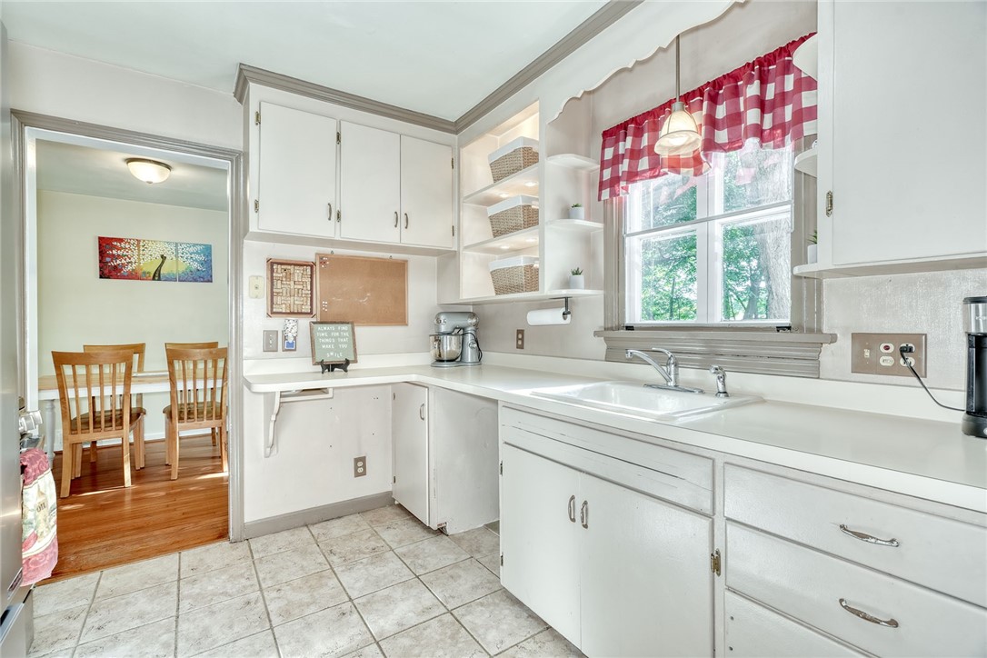 606 Bay Road Webster, NY 14580 - Photo 12 of 49 Bright neutral kitchen! With sink overlooking the