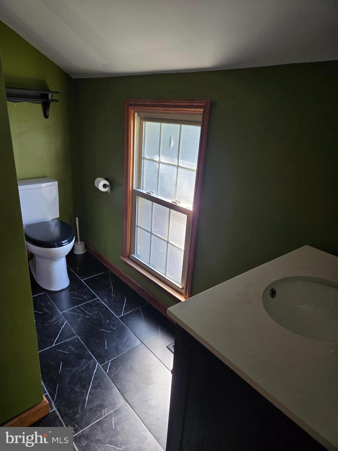 127 3rd Avenue Pitman, NJ 08071 - Photo 15 of 15 a bathroom with a toilet and a sink