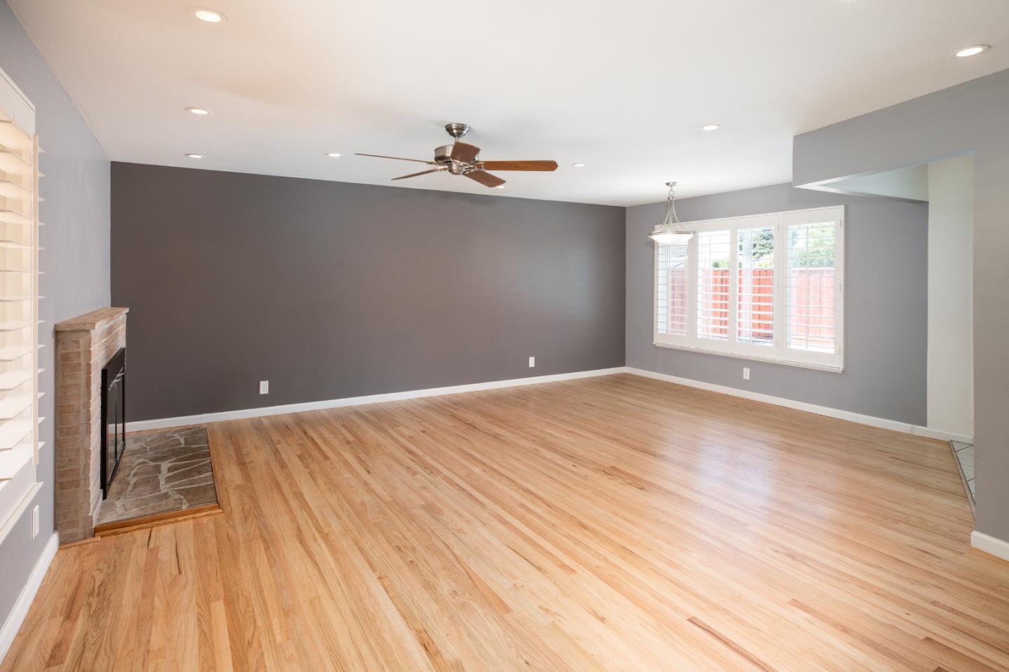 1937 Adelaide Way San Jose, CA 95124 - Photo 6 of 33 a view of an empty room with wooden floor and a window