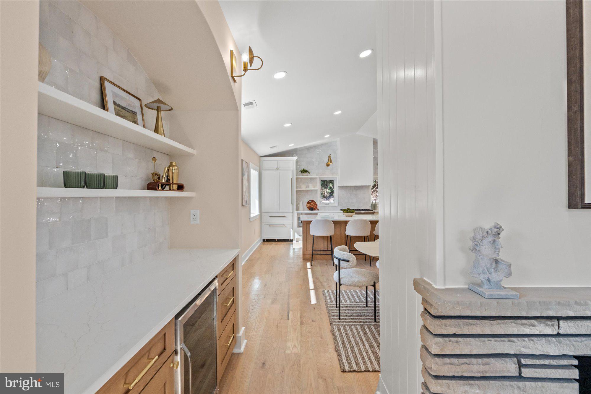6125 Overlea Road Bethesda, MD 20816 - Photo 11 of 61 a view of kitchen with furniture and wooden floor