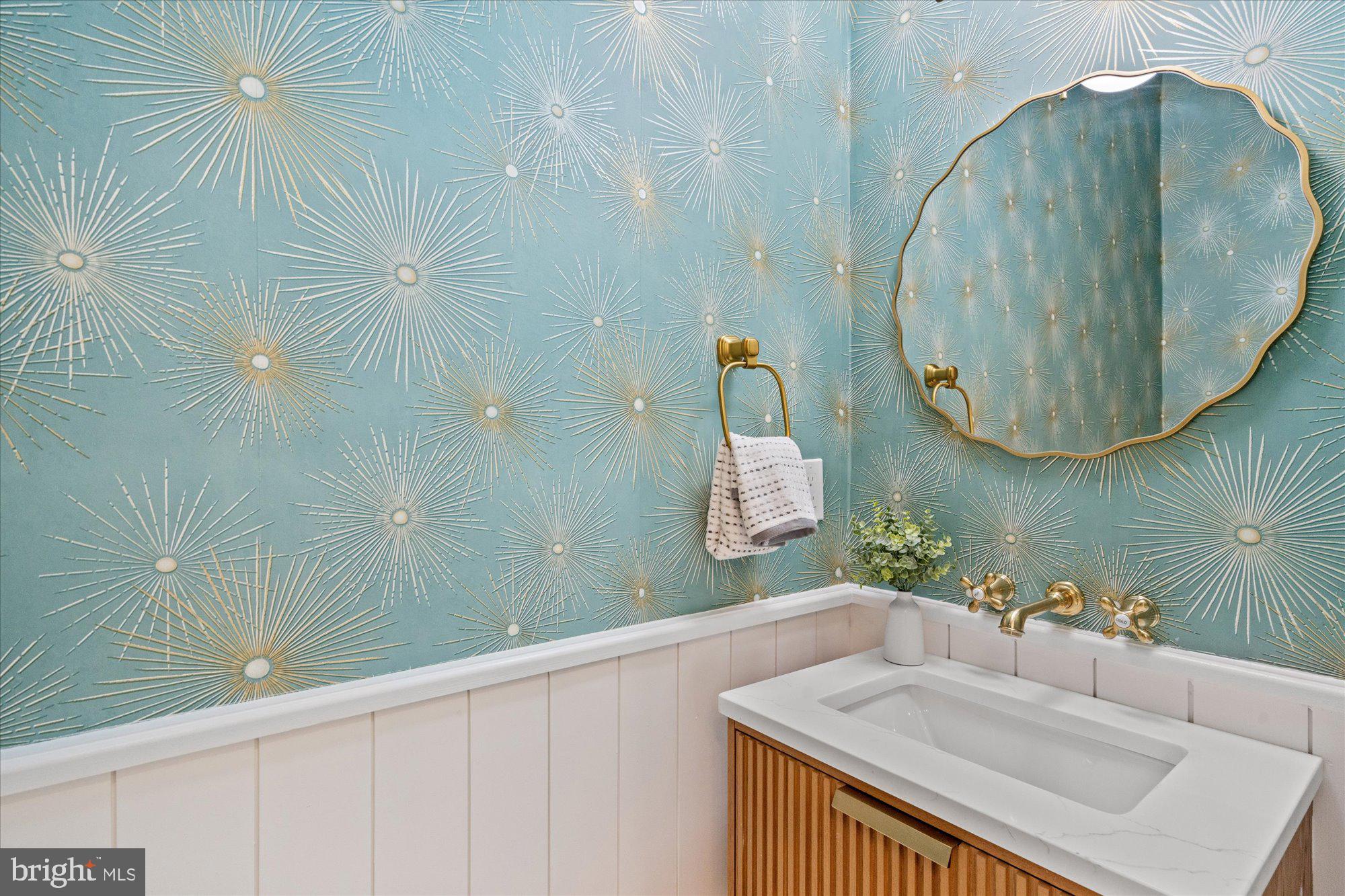 6125 Overlea Road Bethesda, MD 20816 - Photo 15 of 61 a bathroom with a sink and a mirror