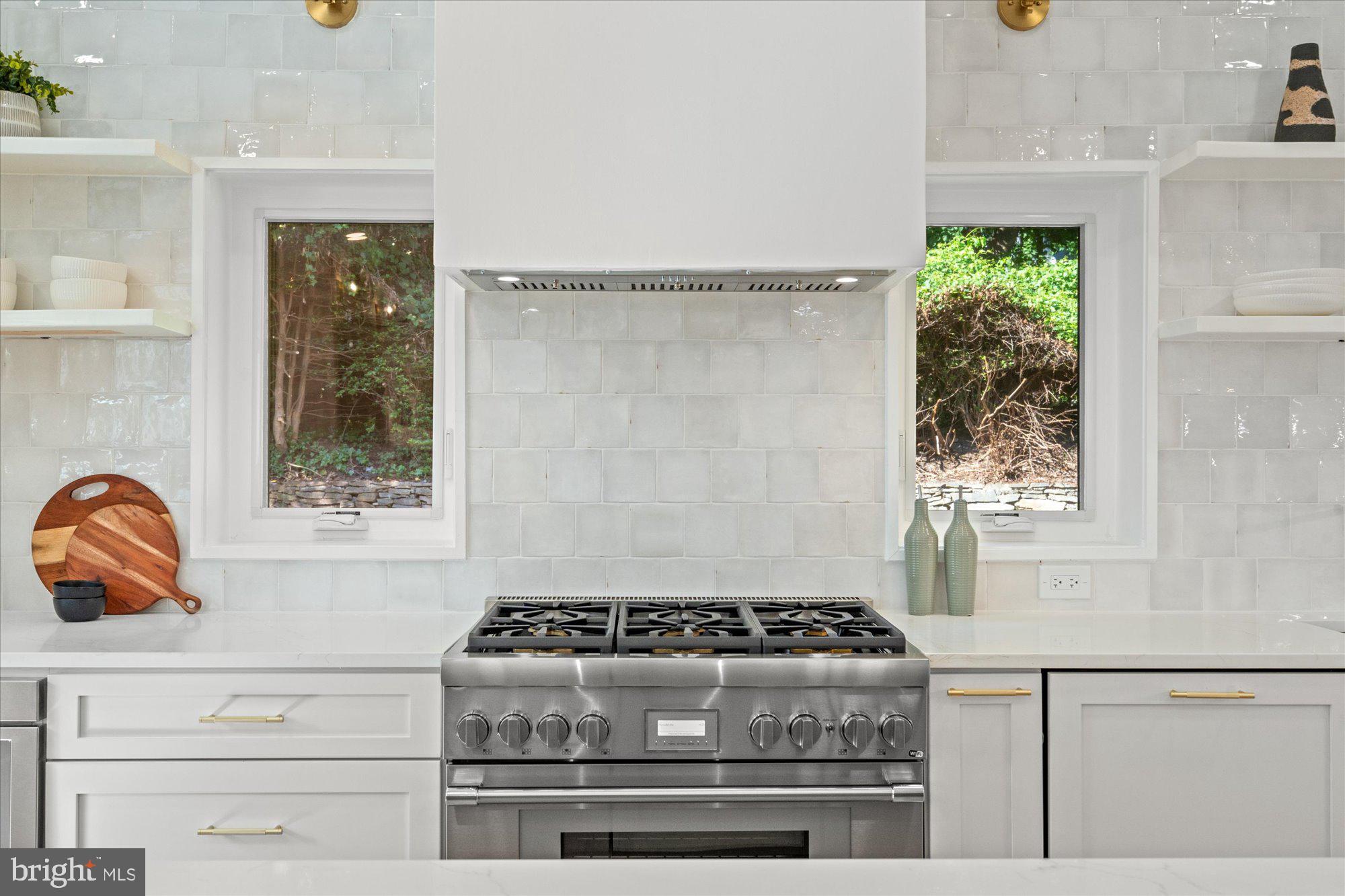 6125 Overlea Road Bethesda, MD 20816 - Photo 20 of 61 a bathroom with a stove and a shower