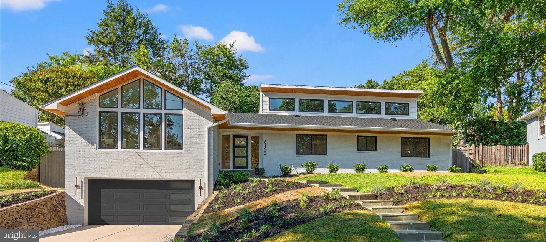 6125 Overlea Road Bethesda, MD 20816 - Photo 2 of 61 a front view of a house with garden