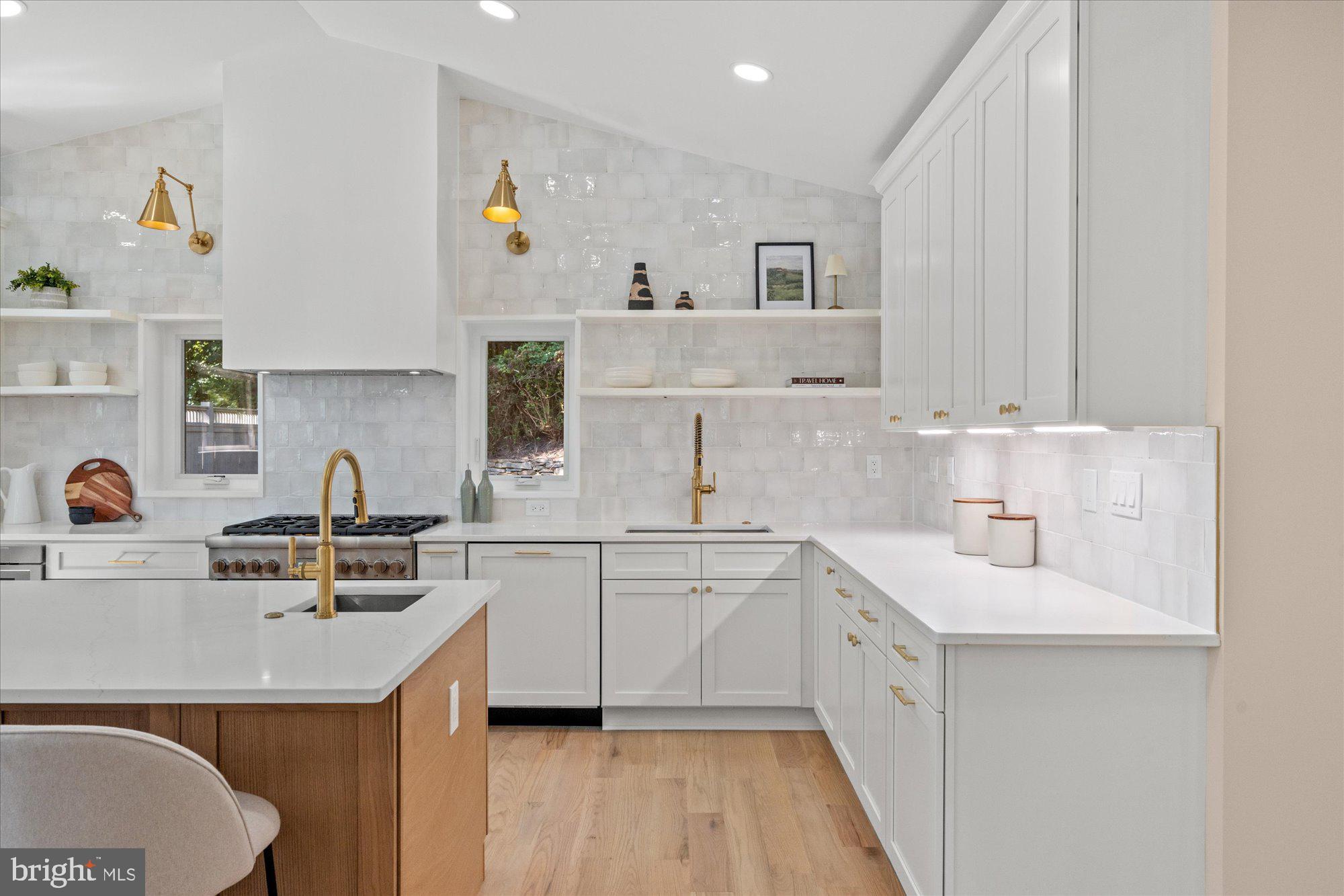 6125 Overlea Road Bethesda, MD 20816 - Photo 21 of 61 a kitchen with a sink cabinets and wooden floor