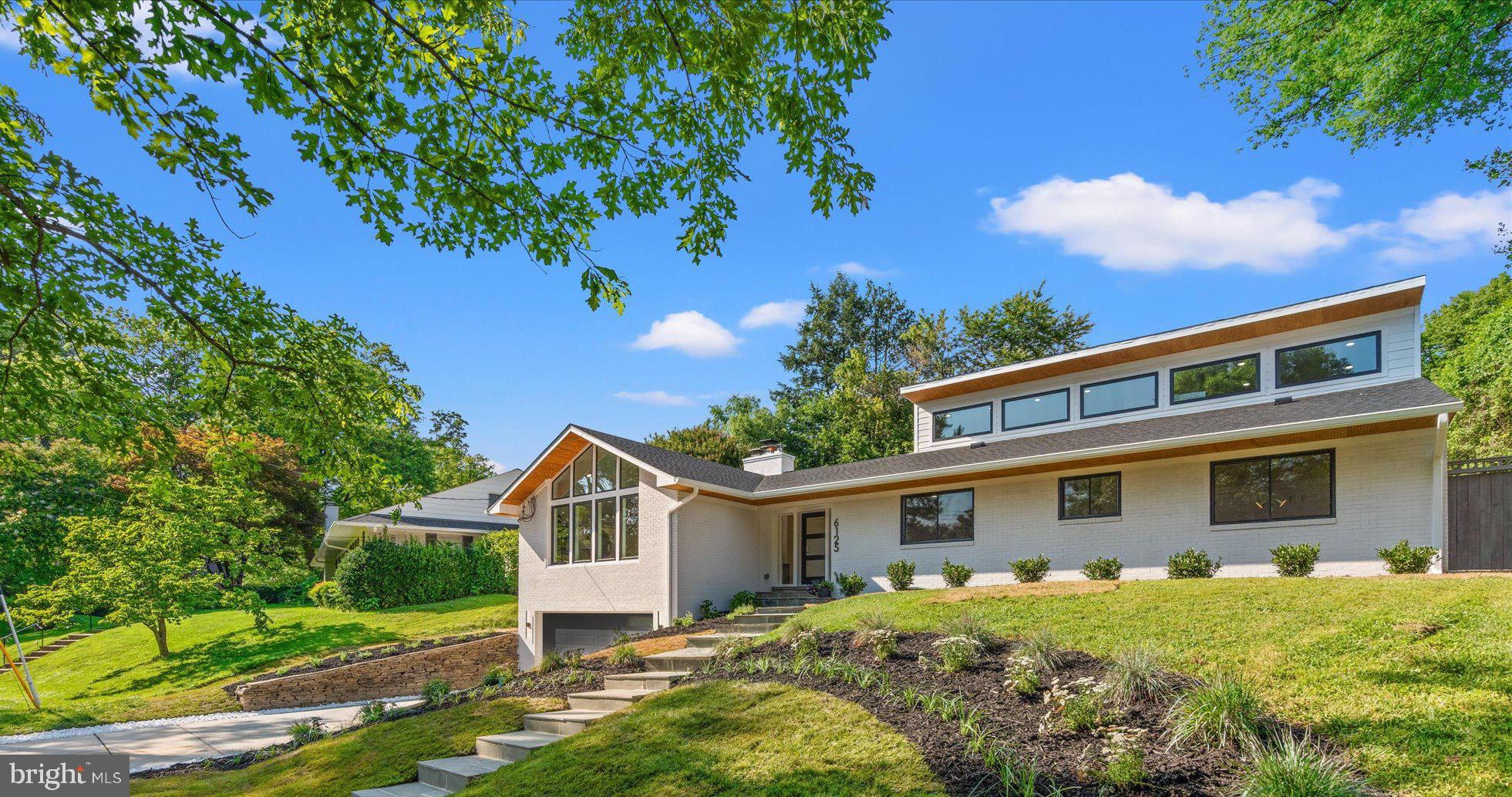 6125 Overlea Road Bethesda, MD 20816 - Photo 3 of 61 a front view of a house with a yard