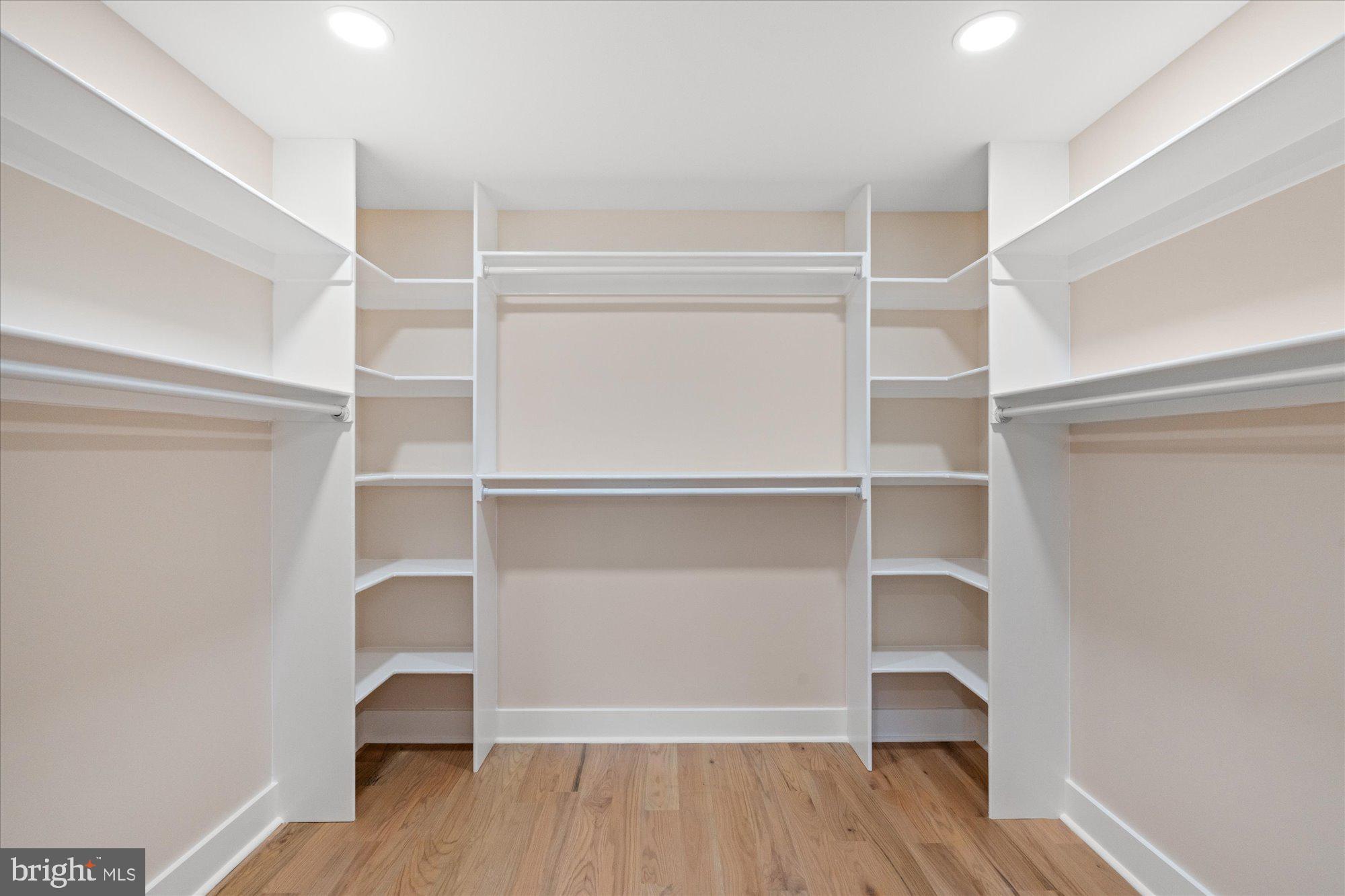 6125 Overlea Road Bethesda, MD 20816 - Photo 34 of 61 a view of walk in closet with empty racks