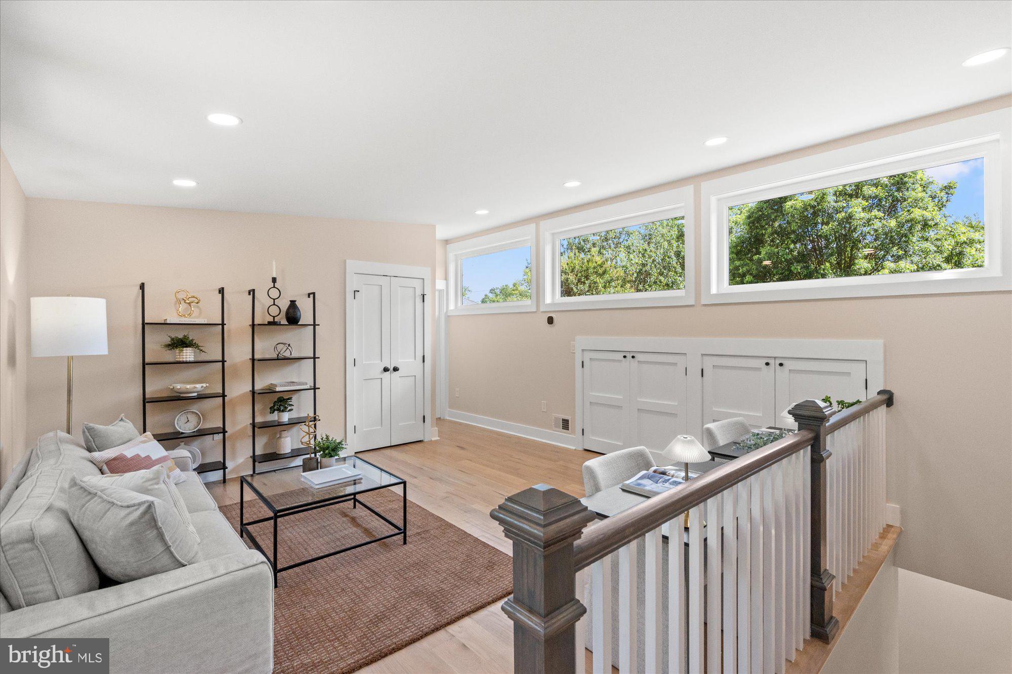 6125 Overlea Road Bethesda, MD 20816 - Photo 44 of 61 a living room with furniture and a large window