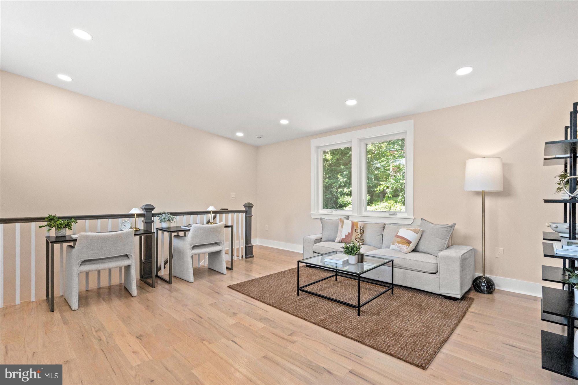 6125 Overlea Road Bethesda, MD 20816 - Photo 45 of 61 a living room with furniture and a wooden floor