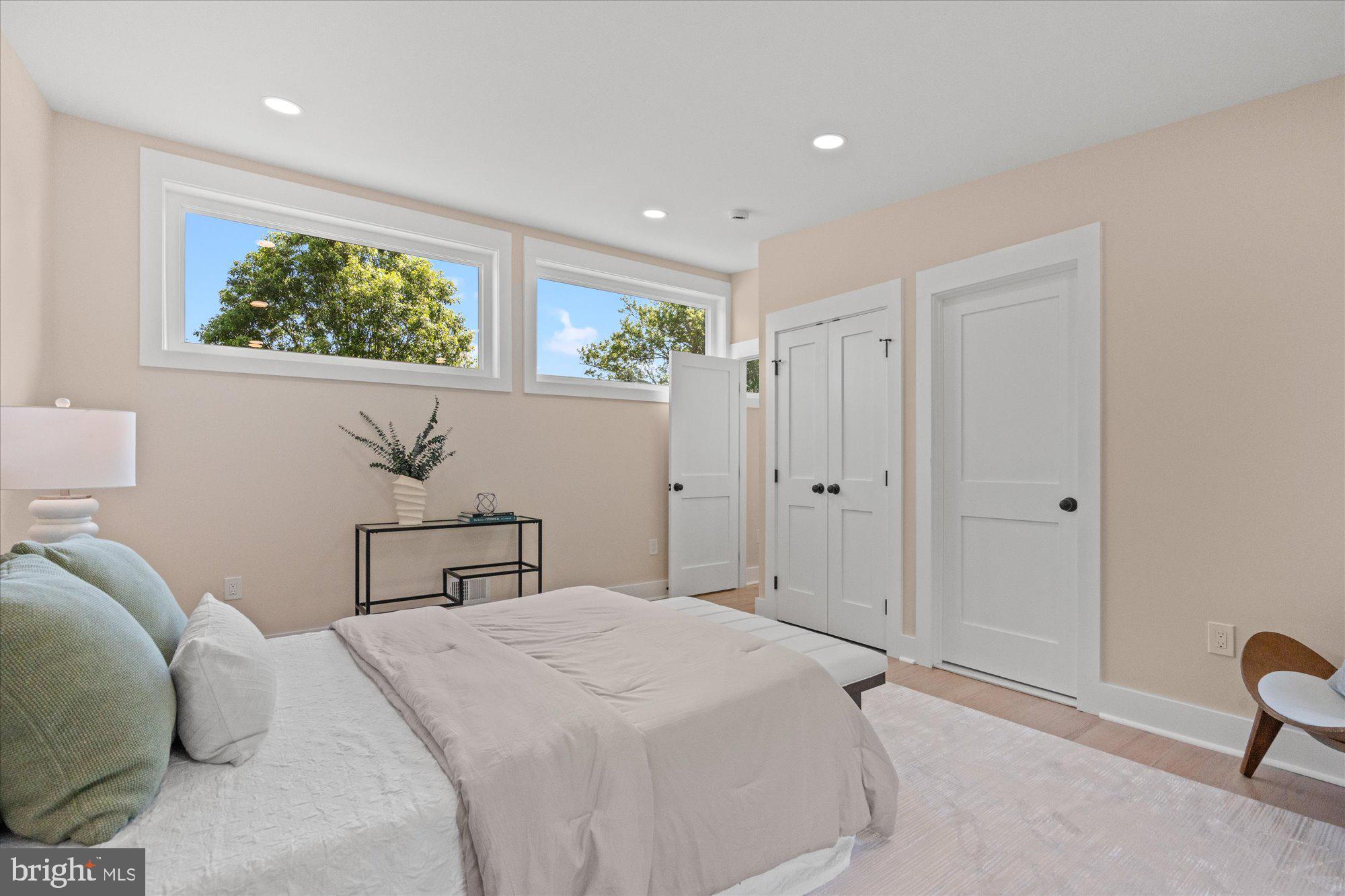 6125 Overlea Road Bethesda, MD 20816 - Photo 48 of 61 a bedroom with a large bed and a window