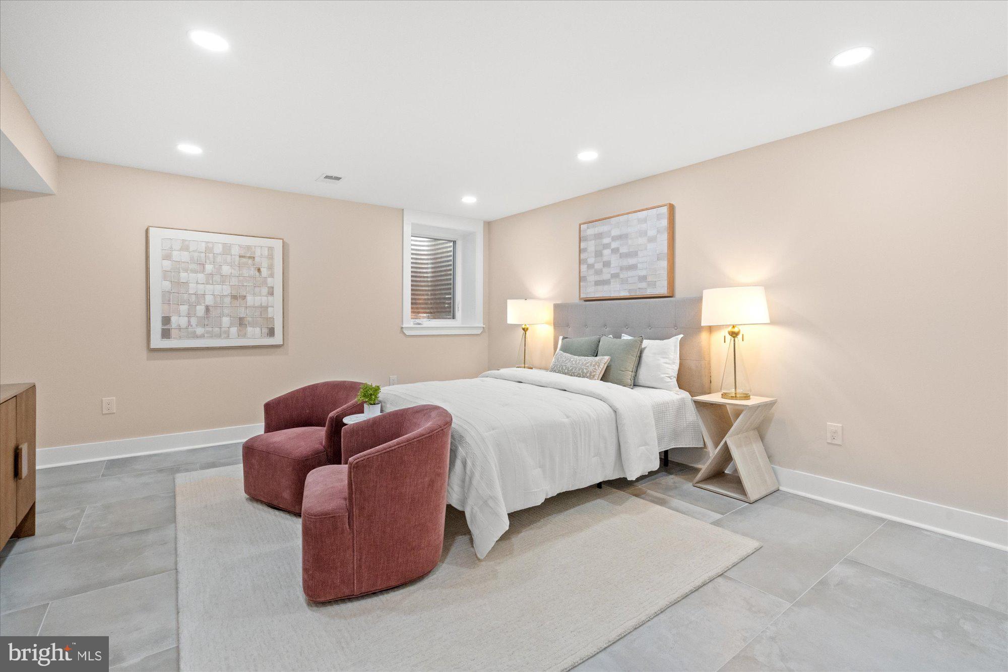 6125 Overlea Road Bethesda, MD 20816 - Photo 57 of 61 a bedroom with bed and a couch