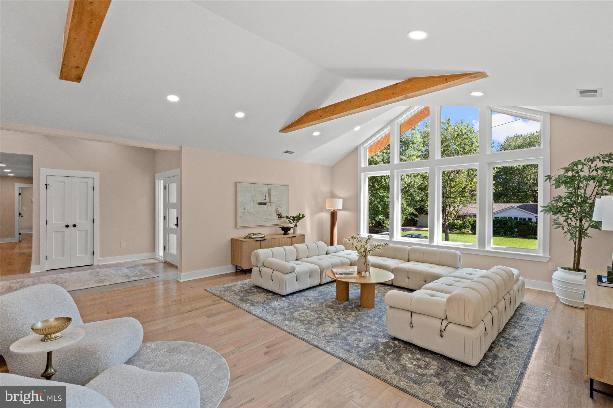 6125 Overlea Road Bethesda, MD 20816 - Photo 6 of 61 a living room with furniture and large windows