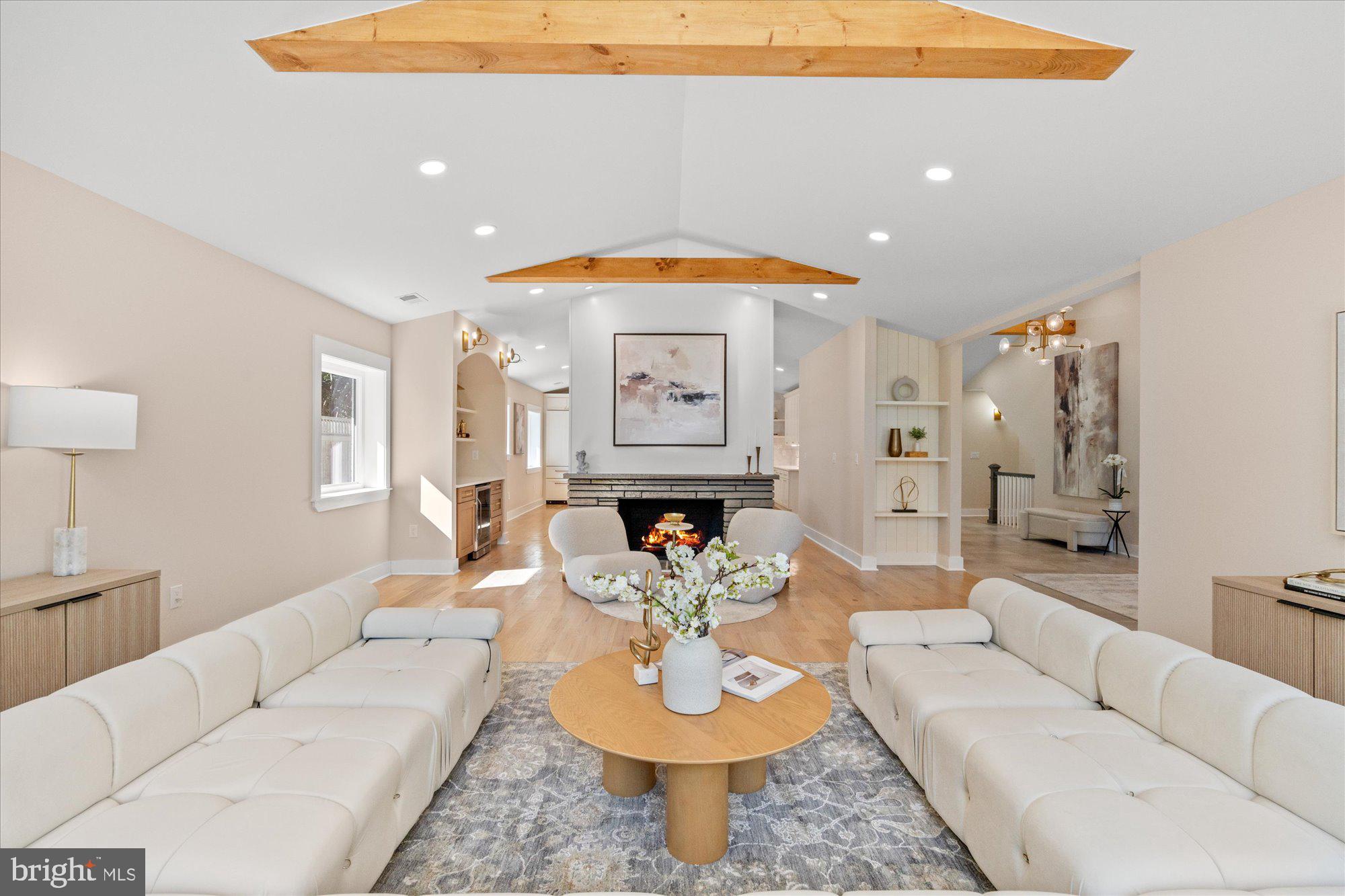 6125 Overlea Road Bethesda, MD 20816 - Photo 7 of 61 a living room with fireplace furniture and a wooden floor