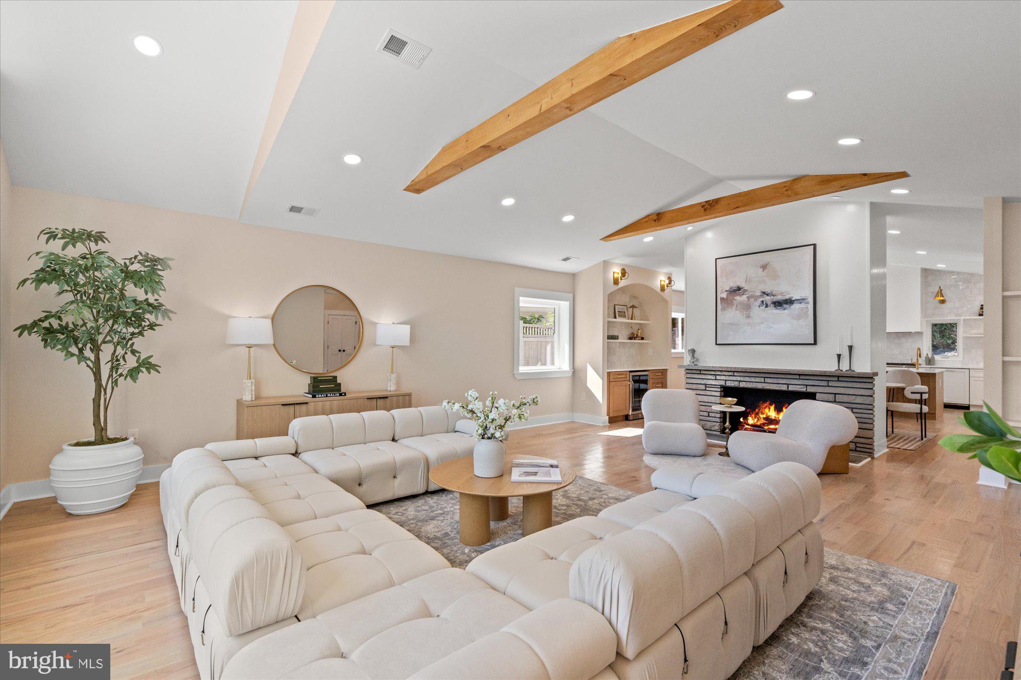 6125 Overlea Road Bethesda, MD 20816 - Photo 10 of 61 a living room with furniture and a large mirror