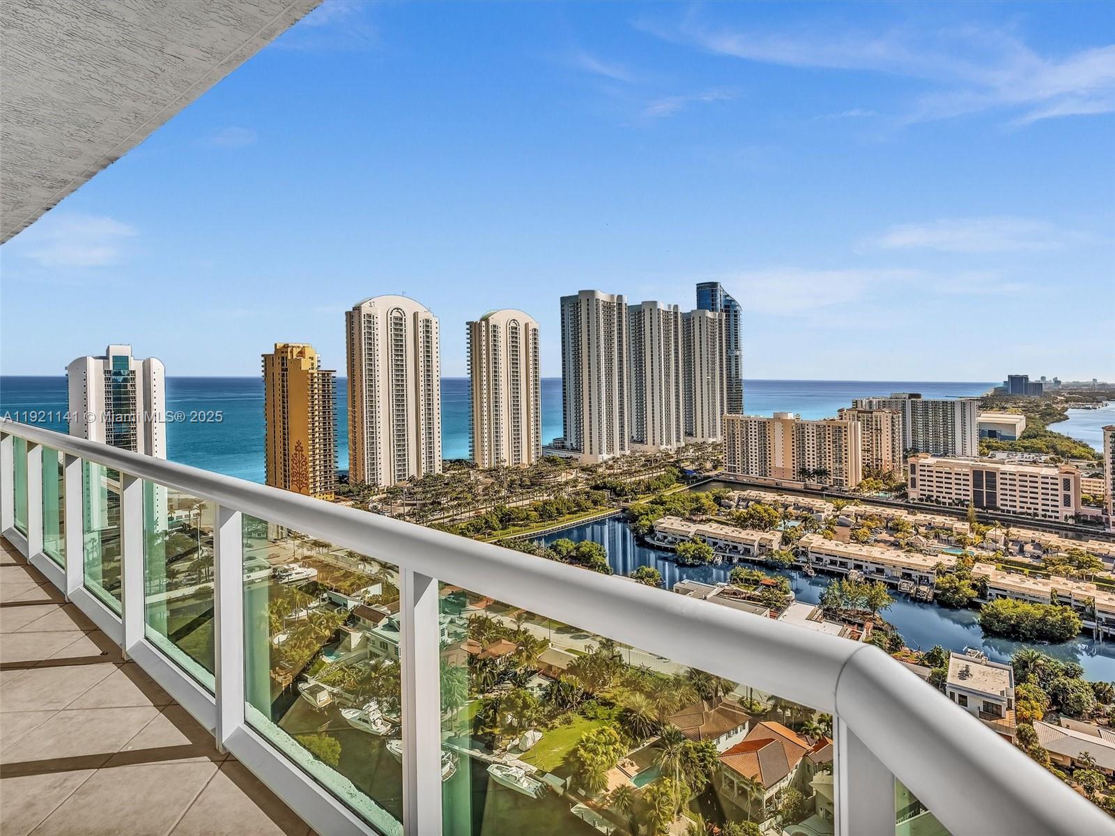 16500 Collins Avenue, Unit PH54 Sunny Isles Beach, FL 33160 - Photo 54 of 97 a view of a city skyline from a balcony