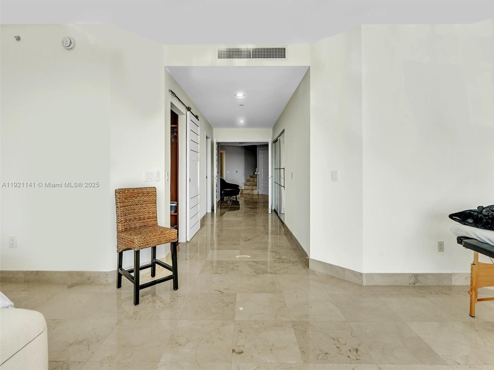 16500 Collins Avenue, Unit PH54 Sunny Isles Beach, FL 33160 - Photo 59 of 97 a view of a hallway with seating area