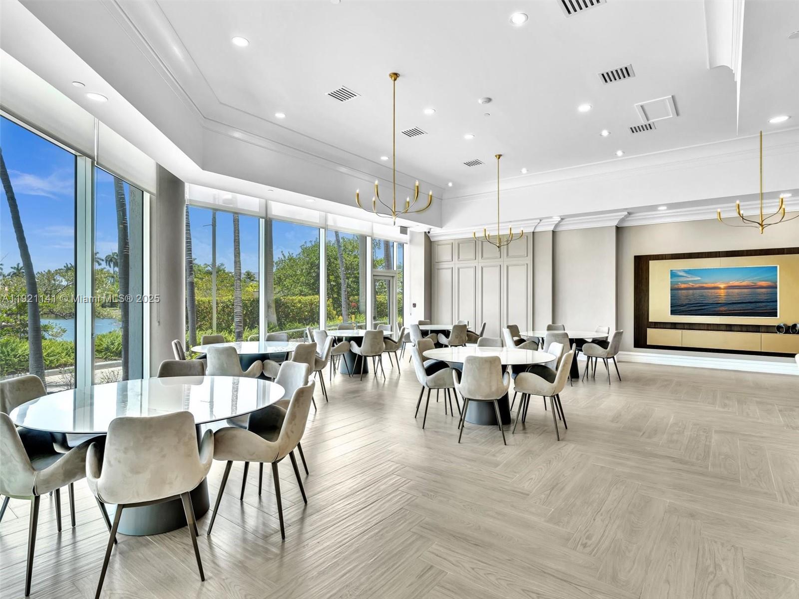 16500 Collins Avenue, Unit PH54 Sunny Isles Beach, FL 33160 - Photo 87 of 97 a view of a dining room with furniture window and outside view