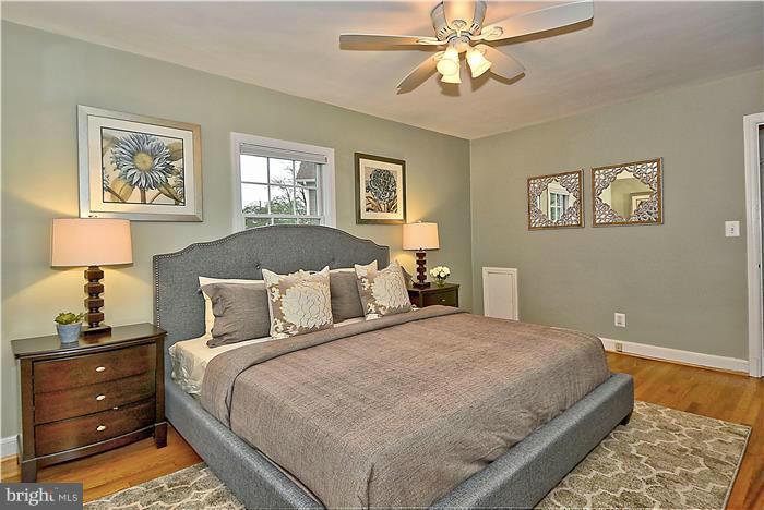 6001 Conway Road Bethesda, MD 20817 - Photo 15 of 26 a bedroom with a bed and a window