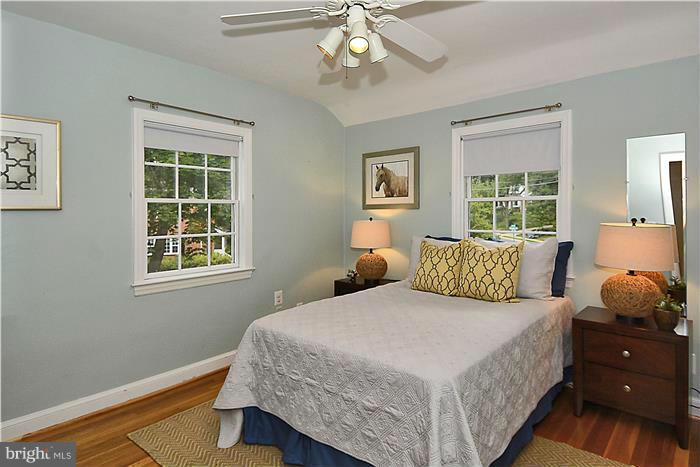 6001 Conway Road Bethesda, MD 20817 - Photo 16 of 26 a bedroom with a bed and window