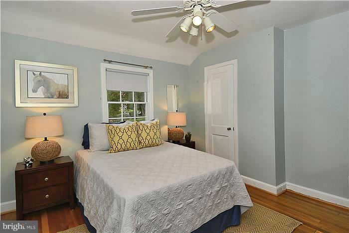 6001 Conway Road Bethesda, MD 20817 - Photo 17 of 26 a bedroom with a bed and window