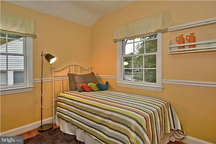 6001 Conway Road Bethesda, MD 20817 - Photo 18 of 26 a bedroom with a bed and a window