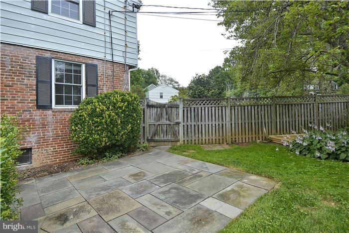6001 Conway Road Bethesda, MD 20817 - Photo 4 of 26 a view of a backyard with a garden