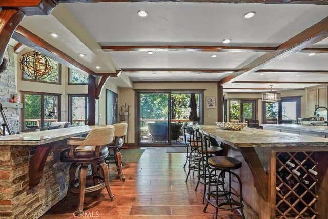 a kitchen with a stove and a refrigerator